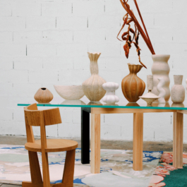 Photo of Penrose table with vases on top Hayo Gebauer Studio